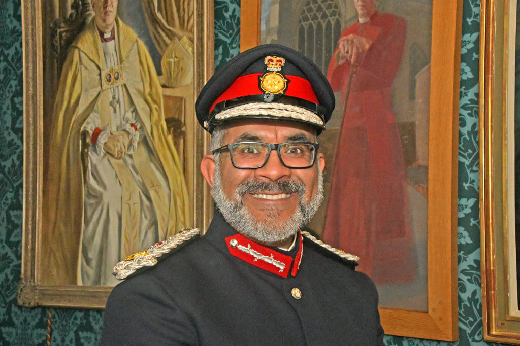 Portrait image of Mohammed Saddiq, the Lord-Lieutenant of Somerset in his official uniform and hat.